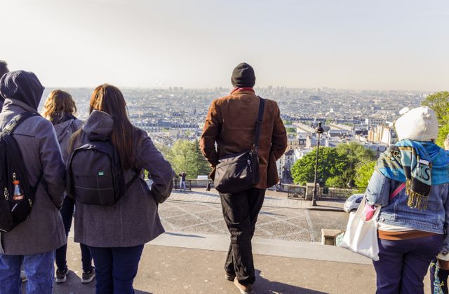 Tourists Walking Near the Gift Shops of Montmartre, Paris, France